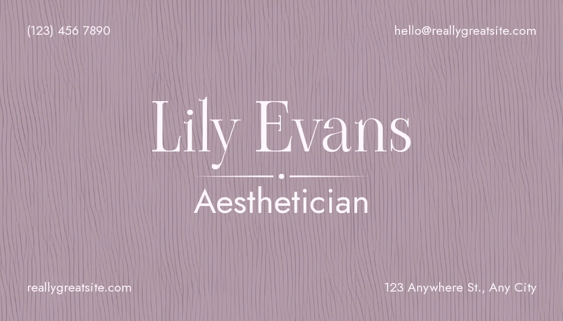A business card for an aesthetician named Lily Evans