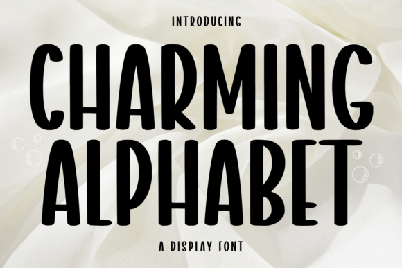 Charming Alphabet Display Font By Minimalist Eyes